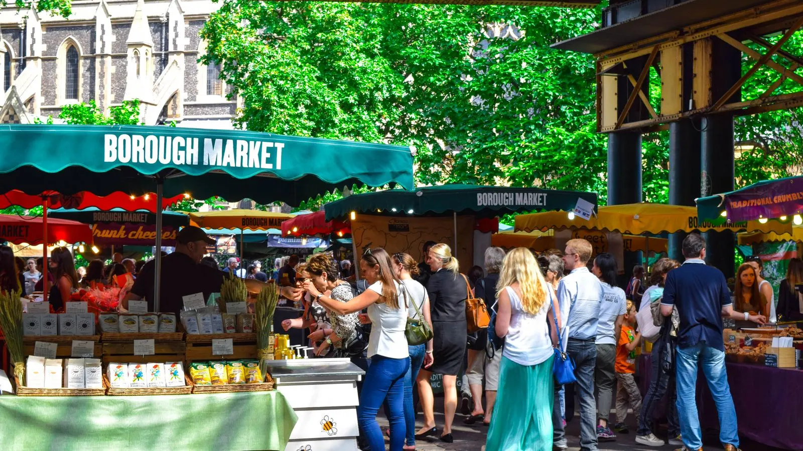Shoppers at Borough Market in London on a busy afternoon